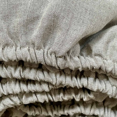 Lniane prześcieradło z gumką natural szaro beżowe
detal, gumka wszyta w lniane preścieradło
