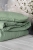 pościel lniana sage green złożona kołdra i poduszka moana 650x975.jpg